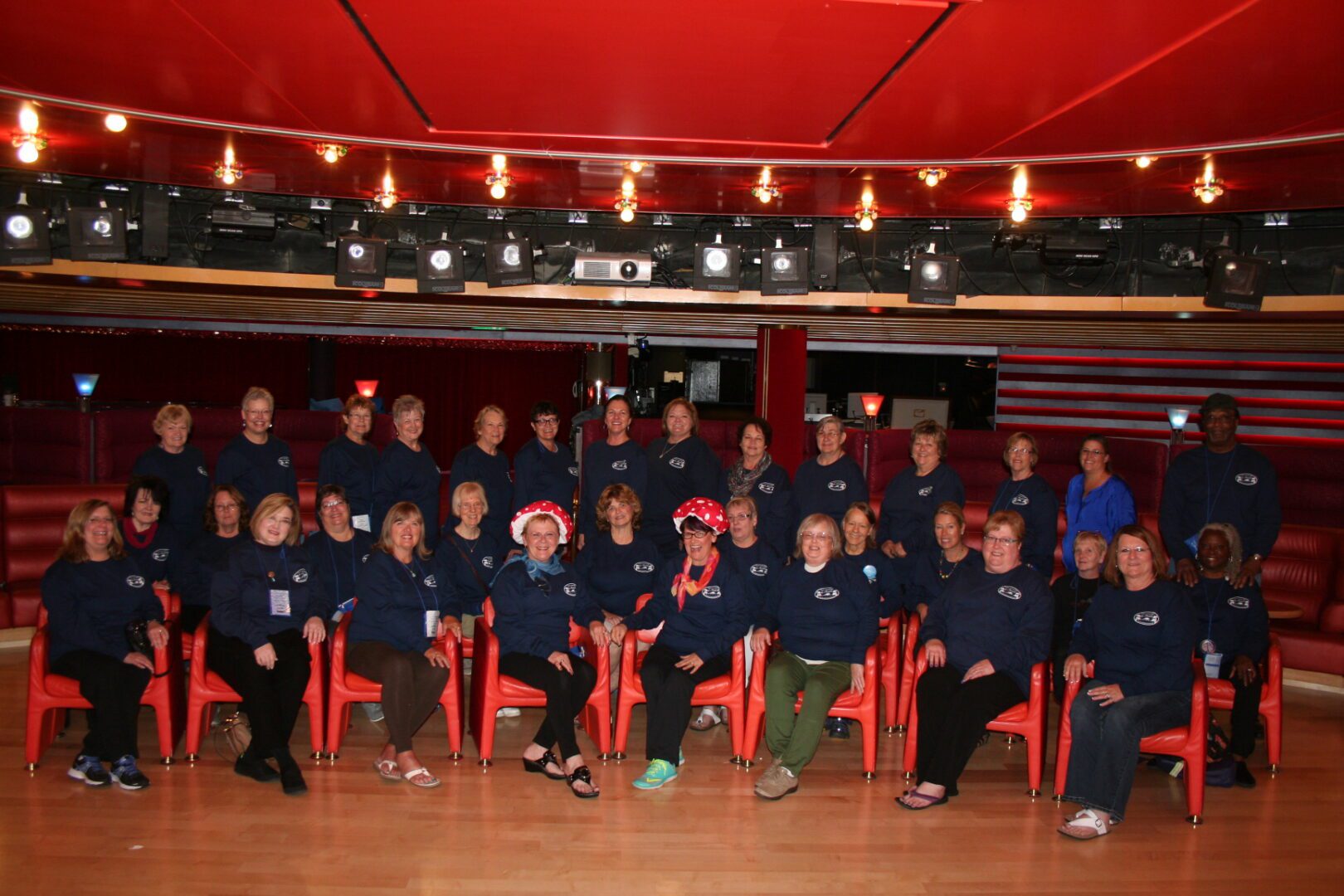 Group photo of people in matching shirts.