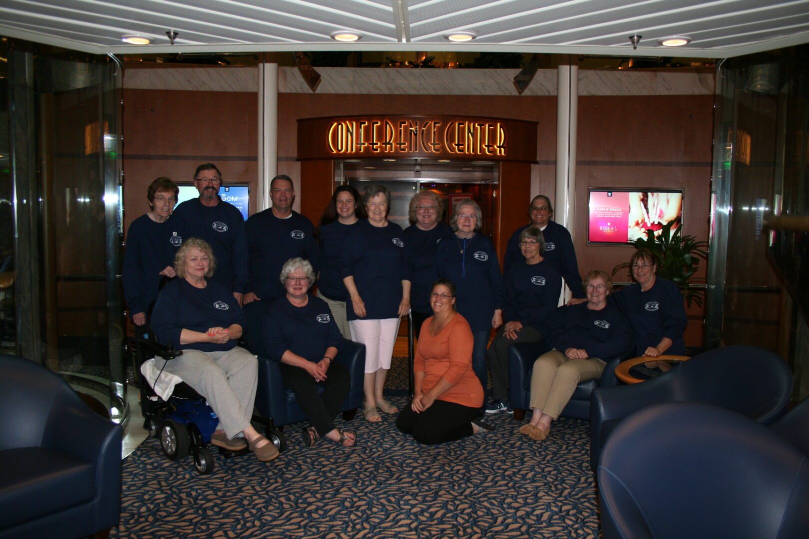 Group photo in front of conference center.
